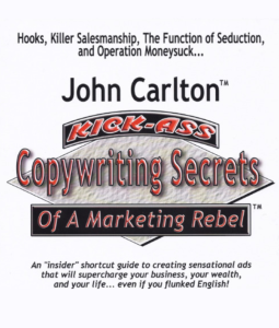 An image of the book cover 'Kick Ass Copywriting Secrets of a Marketing Rebel' by John Carlton. Its focus is on writing long-form ad copy that addresses customer questions to persuade them to purchase products or services.