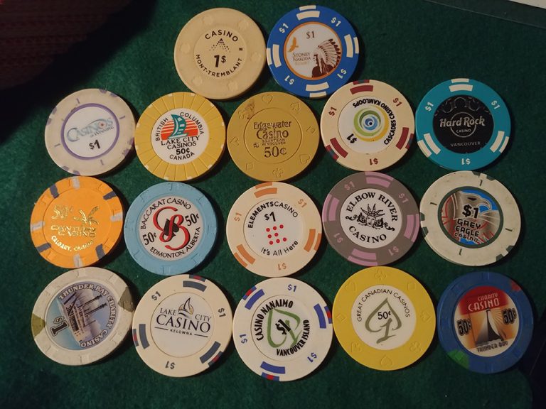 Various casino chips stacked together, representing my journey in card counting across different casinos.