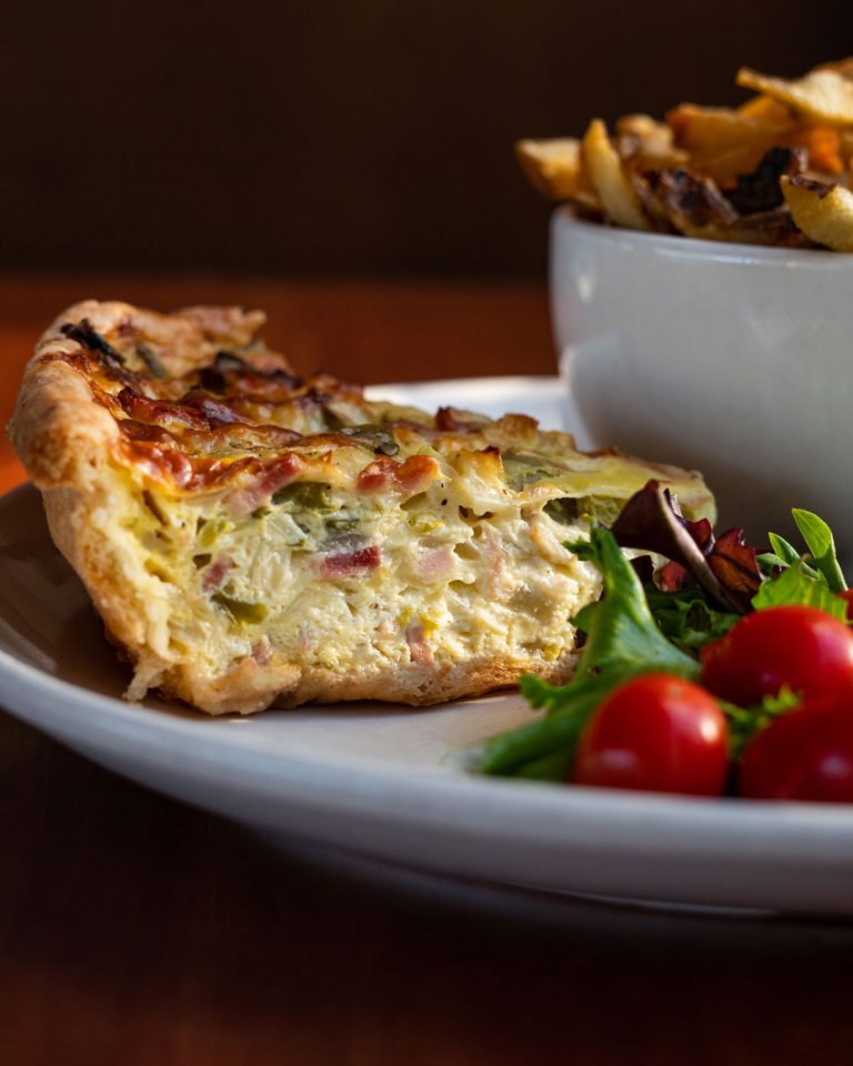 Close-up of a restaurant menu item in Calgary, Alberta, photographed by Cyrus Media.