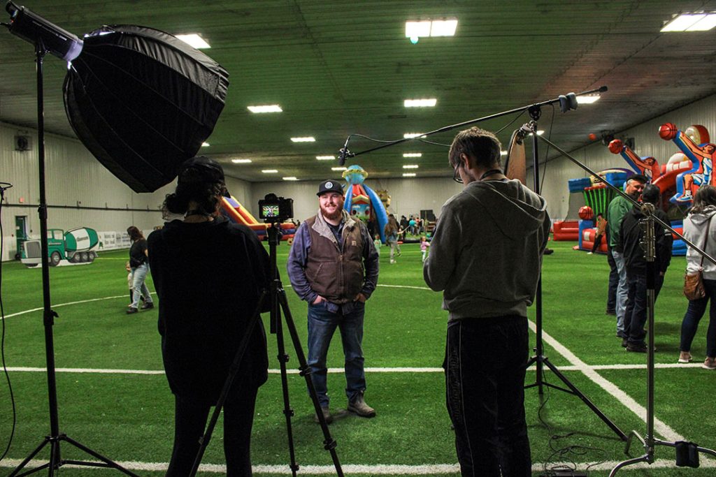 Behind the scenes of Cyrus Media filming interviews for a construction company video promo — industrial and commercial photography and video production.