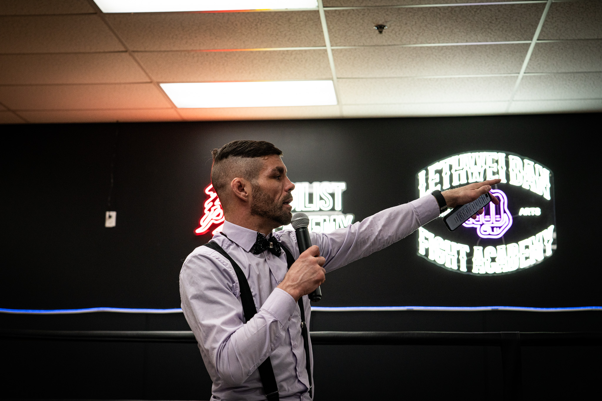 MMA referee speaking in the ring during an amateur fight night at A Foot Above Fitness gym